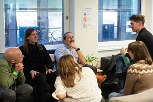 A team of Spektrix staff members deep in conversation