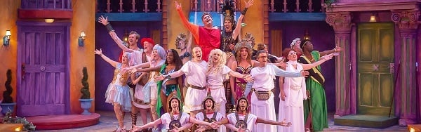 Performers onstage at Cincinnati Shakespeare Company, dressed in Roman-style costumes