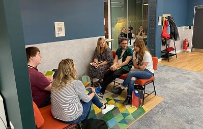 Users chatting during a breakout session at the Manchester Hub