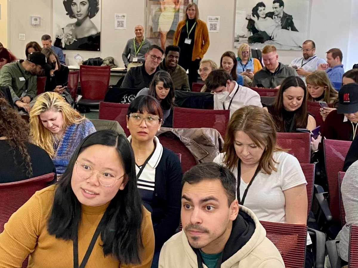attendees sit in eager work mode during an activity