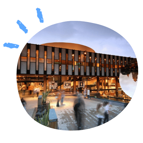 A busy day in the square outside Nottingham Playhouse, with crowds passing by