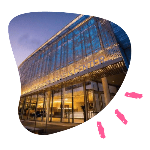 The glass front of Sacramento Philharmonic on a sunny day