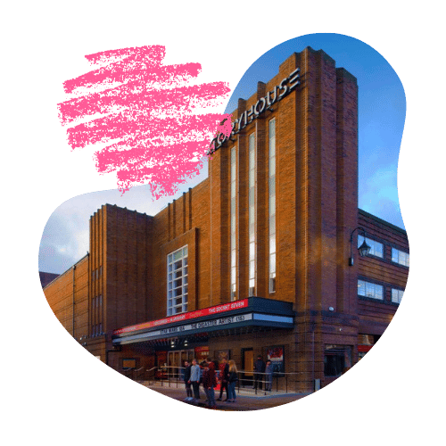 The tall red brick tower of Storyhouse, housed in an old art deco cinema