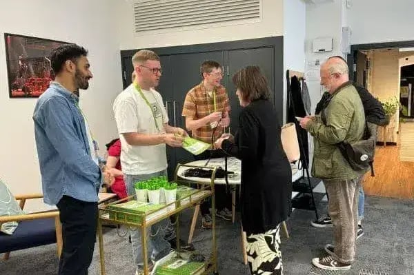 spektrix employees greeting attendees of the hubs conference in manchester 2024