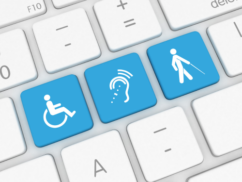 an image of keyboard keys with accessibility symbols on them