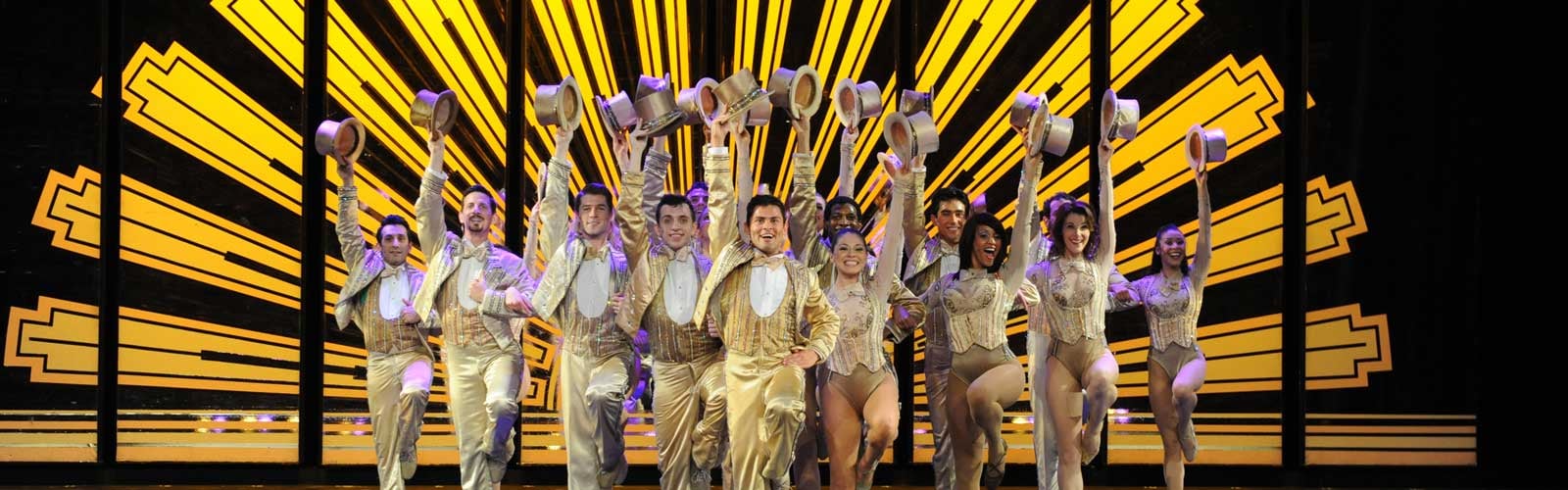 A line of singers perform in A Chorus Line at Musical Theatre West