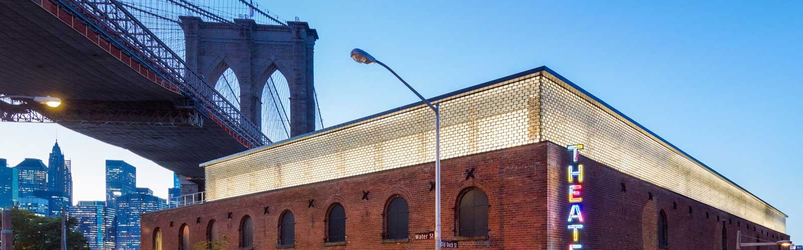The exterior of St Anns Warehouse at night