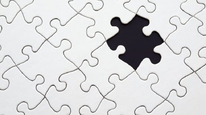 A jigsaw with a single missing piece