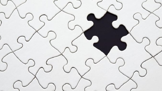 A jigsaw with a single missing piece