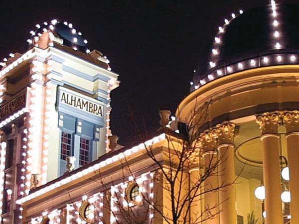 Bradford Theatres Alhambra exterior lit up at night