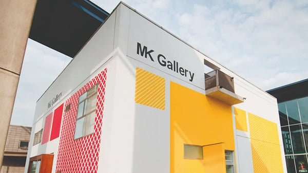 Exterior of MK Gallery, a square, modern building in primary colours