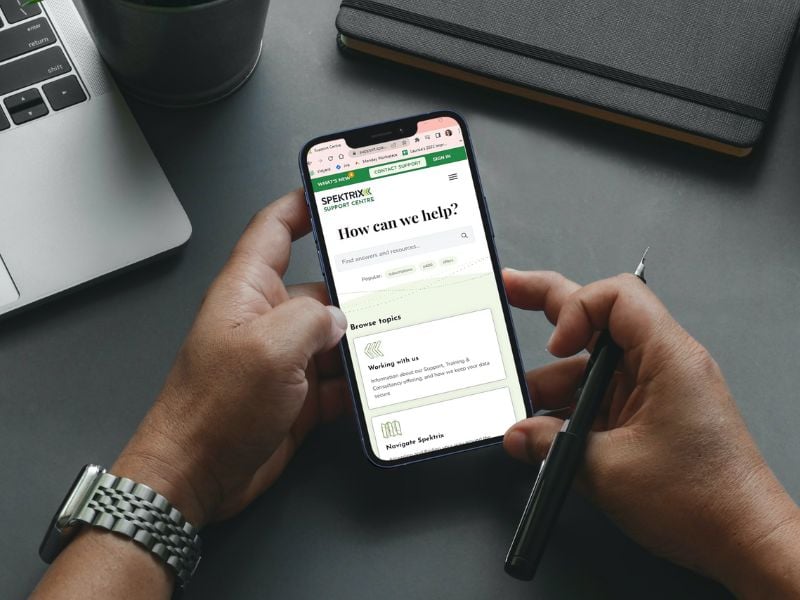 Person accessing the Spektrix Support Centre on their mobile device