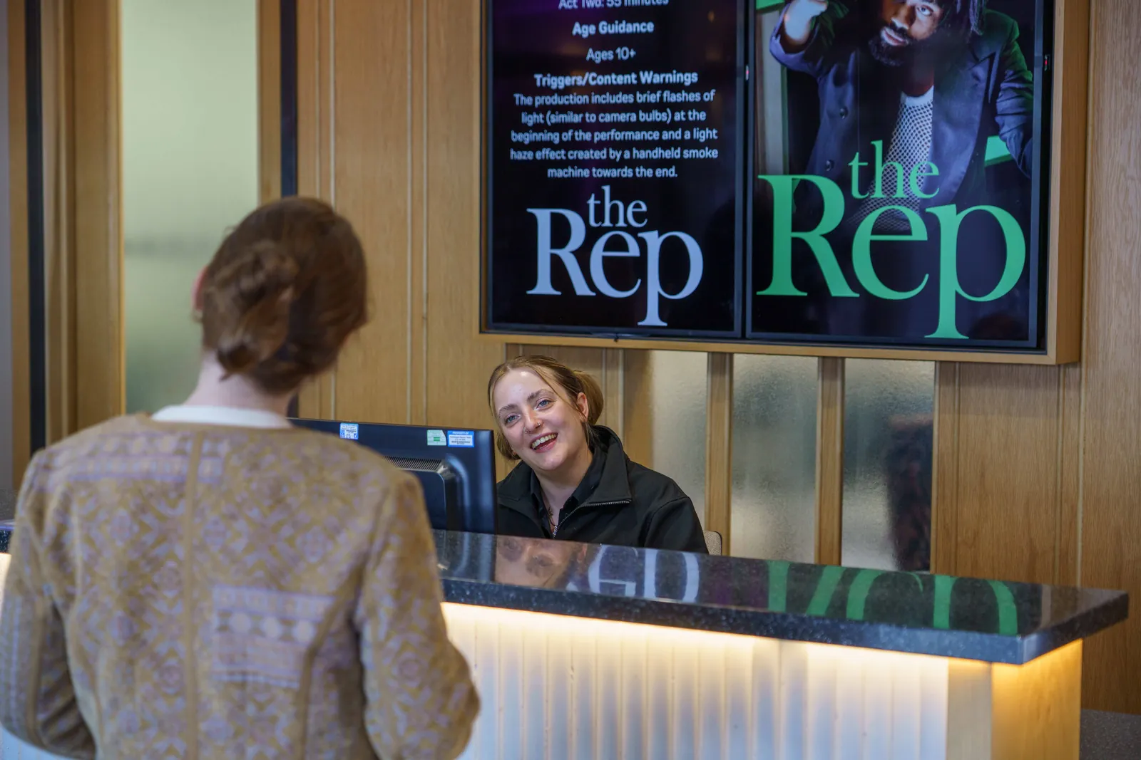 Binghamton Rep Box Office Worker Helping Ticket Program Customer Smiling 2