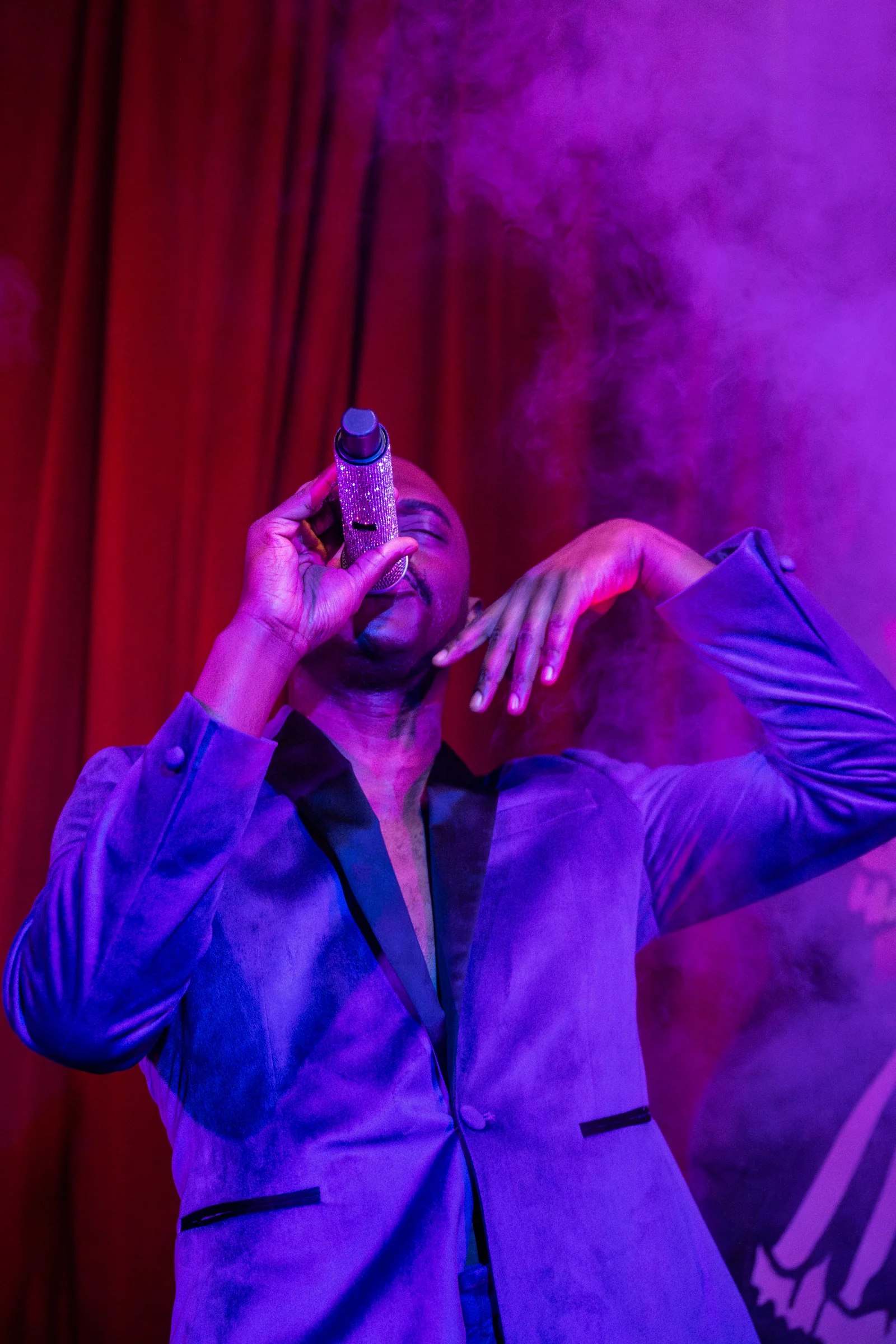 Can Can Culinary Cabaret Singer Purple Stage Lighting