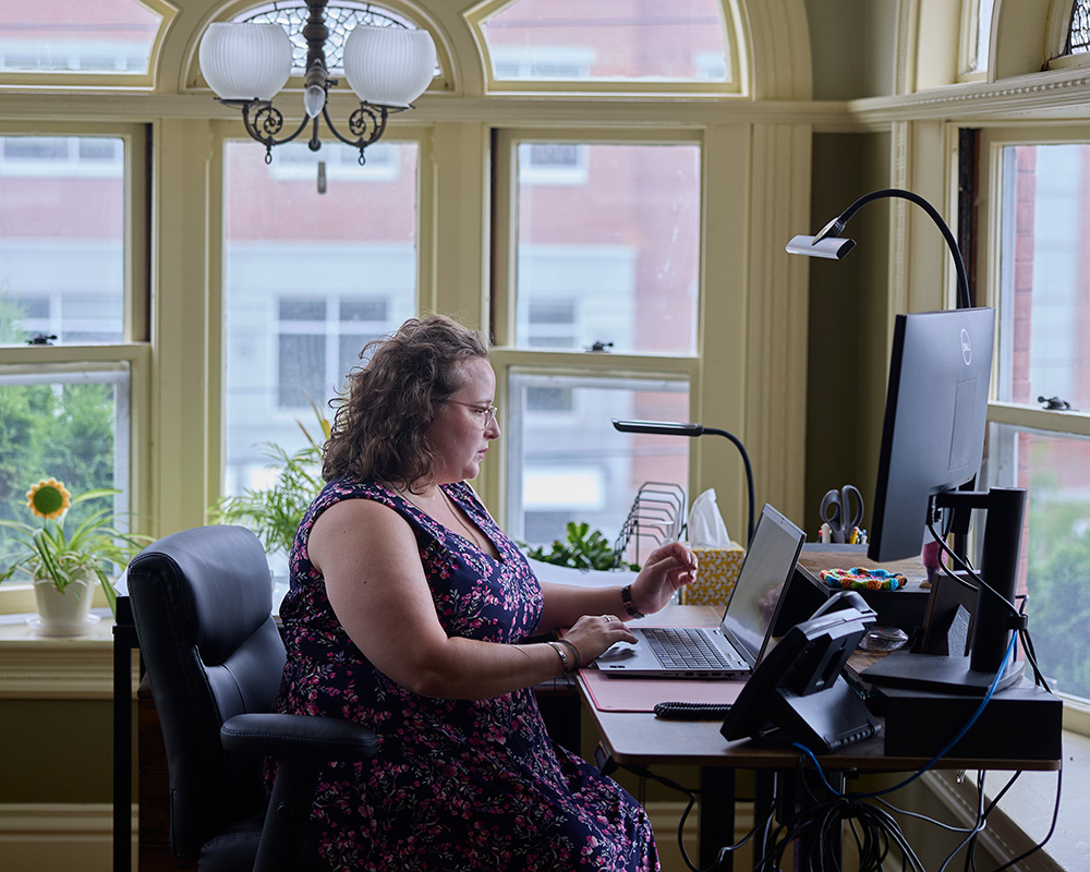 A Theater Worker At A Desktop At The Capital Center For The Arts New Hampshire