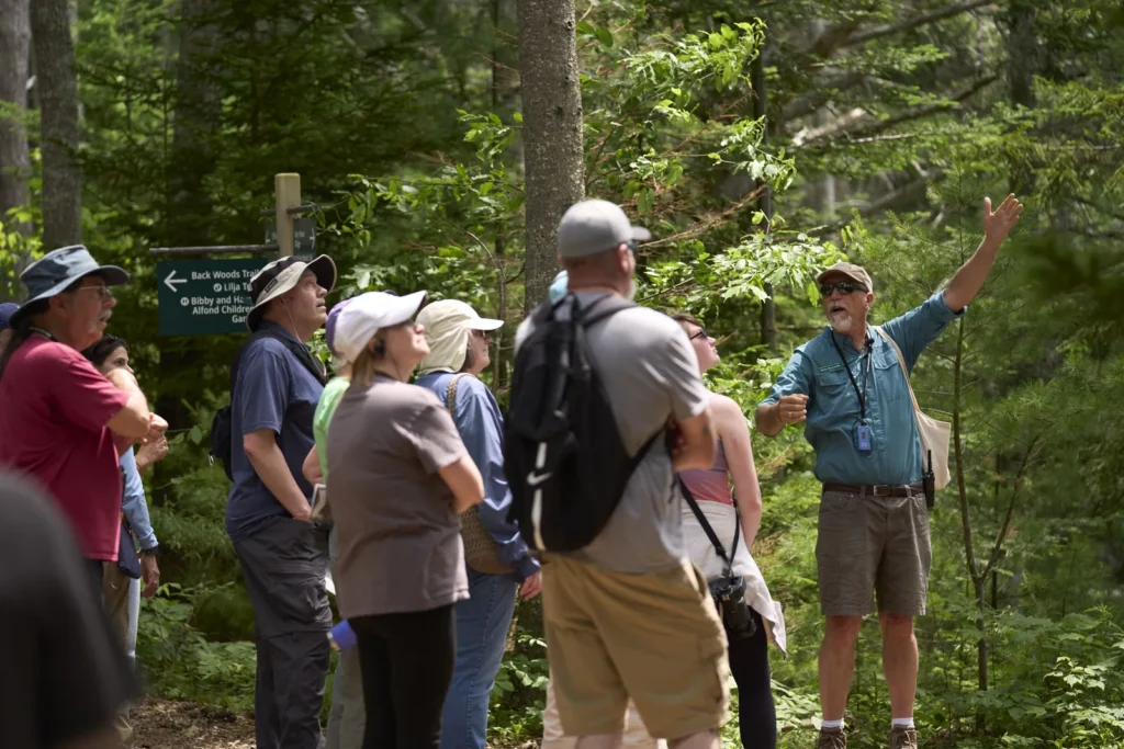 Invisible Tech, Unforgettable Visits: Why Visitor-First Botanical Garden Ticketing Software Matters 3 Coastal Maine Botanical Garden Exterior Visitors Customers Tour Guide