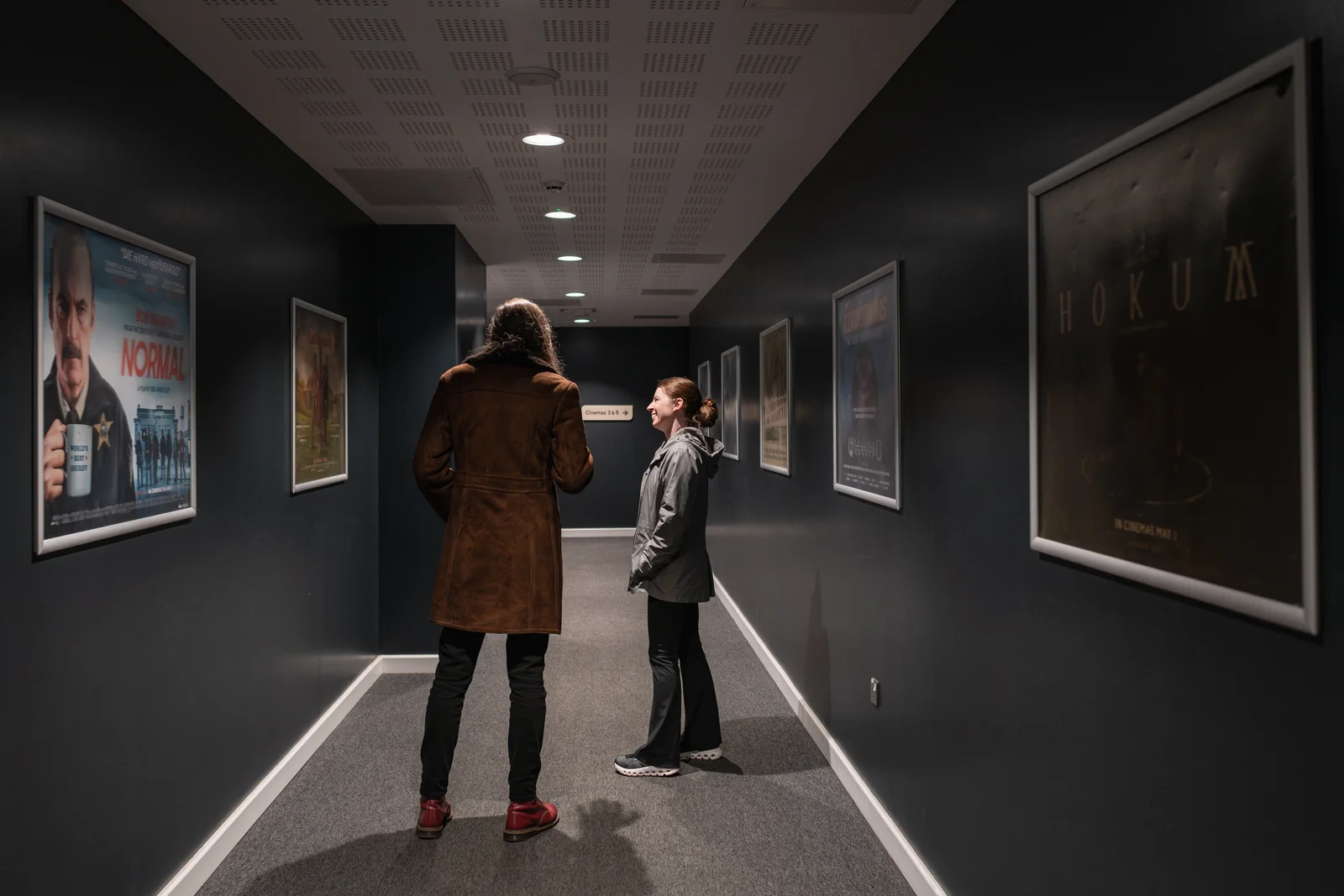 Home Manchester Cinema Corridor Posters And Visitors Photo Credit Michael Kirkham