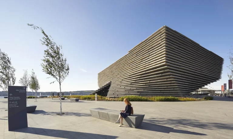 V And A Dundee Scotland Exterior Plaza Signage And Visitor Bench Photo Credit Hufton Crow