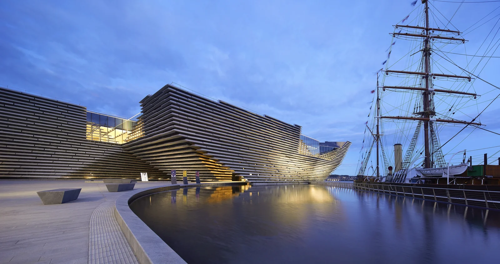 V And A Dundee Scotland Exterior Waterfront Evening With Ship Photo Credit Hufton Crow